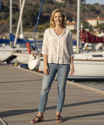 Natalie at a marina dock on a navy dating site